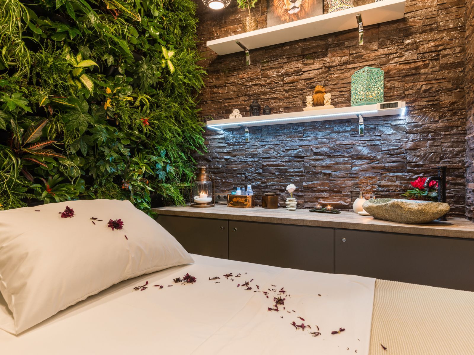 Jungle massage room with living tropical plants at Enjoy Spa