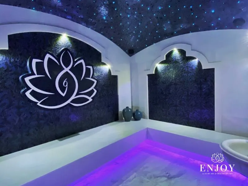 White marble Turkish hammam with a starry-sky ceiling at Enjoy Spa Moscow
