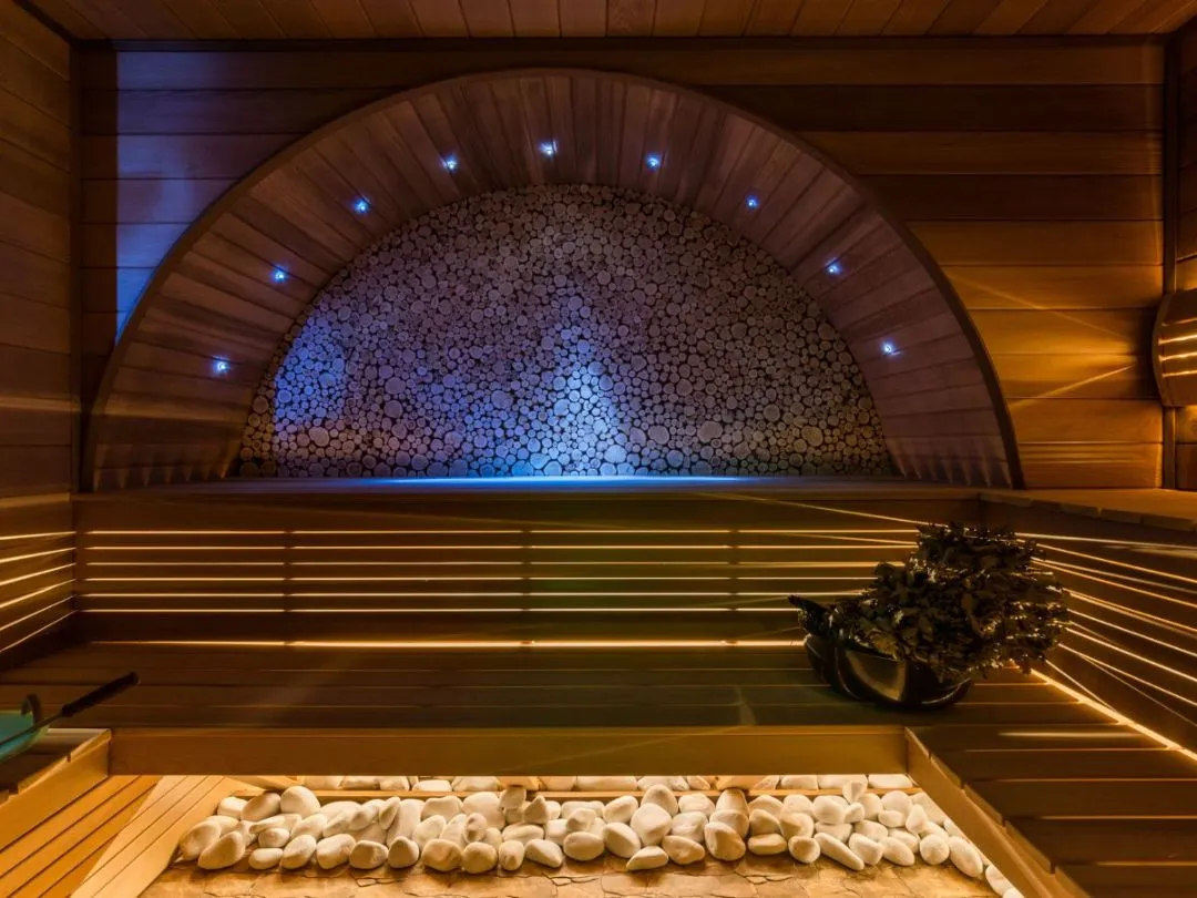 Canadian cedar Finnish sauna with an IKI stove at Enjoy Spa